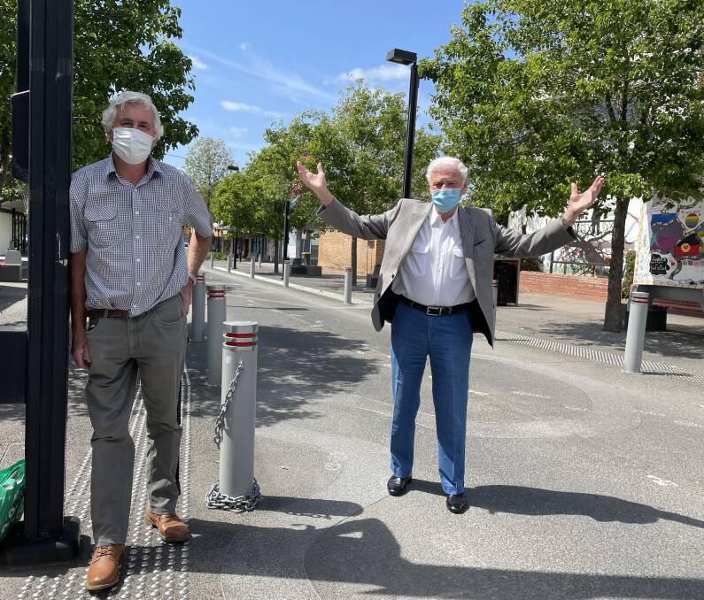 WHY: Nowra CBD property owners John Bowden (left) and John Macey have questioned why Junction Court is being closed now just as the region reopnes after COVID restrictions.