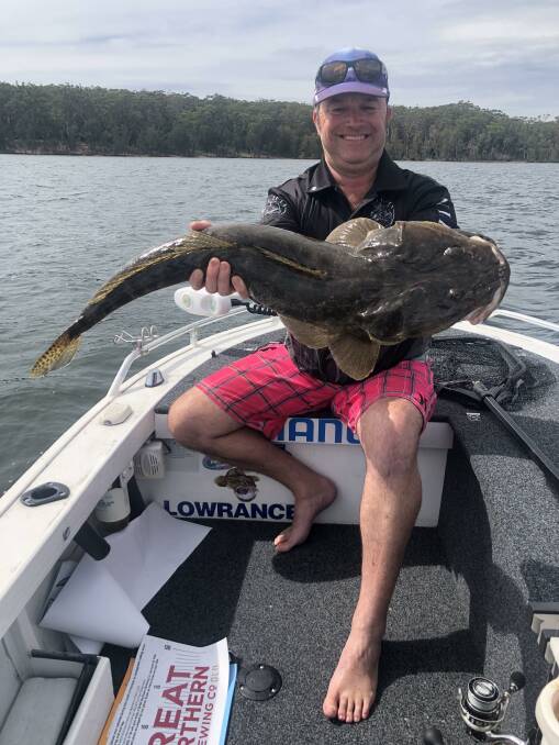 WINNER: Mal Gilham of Tuross Head with his winning flathead in 2020. Image: Supplied. 