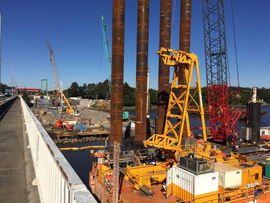 BUSY SITE: Work on the new $342 million Nowra bridge is progressing quickly with the first piles in the actual Shoalhaven River being installed.

