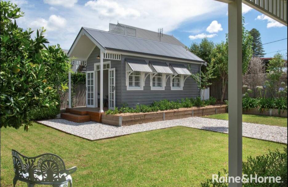 GETAWAY: The property comes with a luxurious self-contained garden cottage, perfect for entertaining or a peaceful space, with vaulted ceilings, bedroom/living space, kitchenette, quality bathroom and timber deck. Photo: Supplied