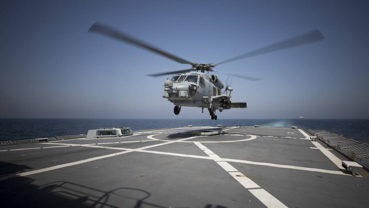 HMAS Warramunga’s deployed MH-60R Seahawk Romeo helicopter, Nemesis, from 816 Squadron at HMAS Albatross played a major role in many drug busts in the Middle East. Photo: Tom Gibson