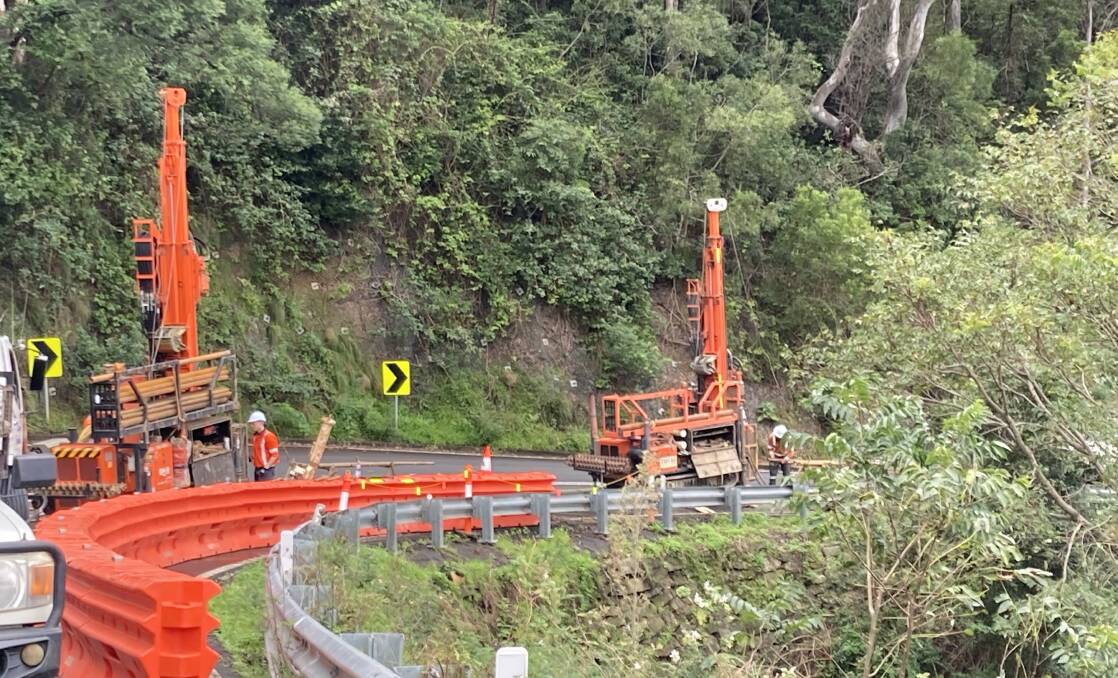 WORK: Moss Vale Road over Cambewarra Mountain has reopened, albeit as a single lane, under traffic control. Transport for NSW and geotechnical specialists recently carried out field investigations to determine sub-surface material layers and foundation conditions. Image: Transport for NSW