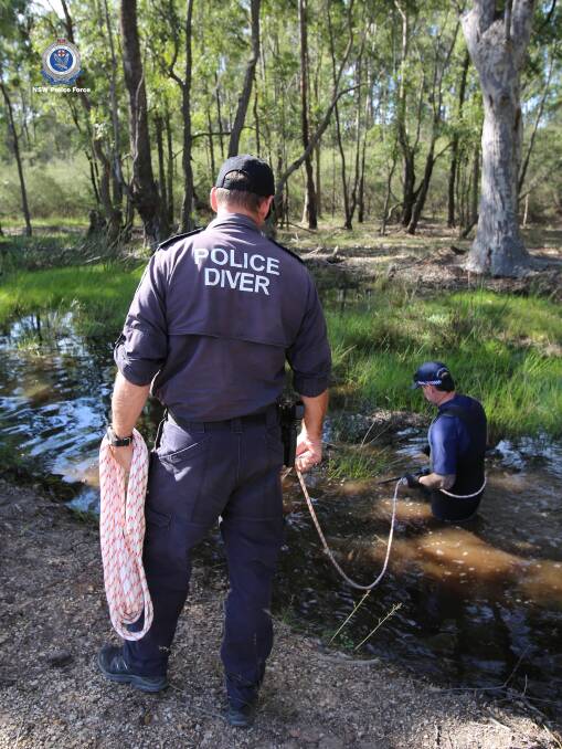Police officers during their forensic search of bushland south of Nowra for any evidence of missing Sydney woman Samah Baker. Image: Police Media