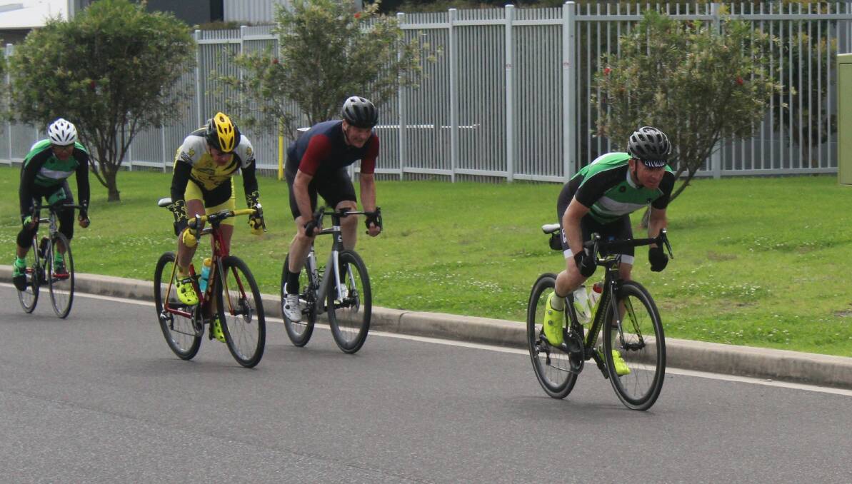 SPRINT FINISH: Jason Spence sprints to the C grade race win ahead of Peter Bresser, Dave Gray and Adrian McMillan. Image: Supplied