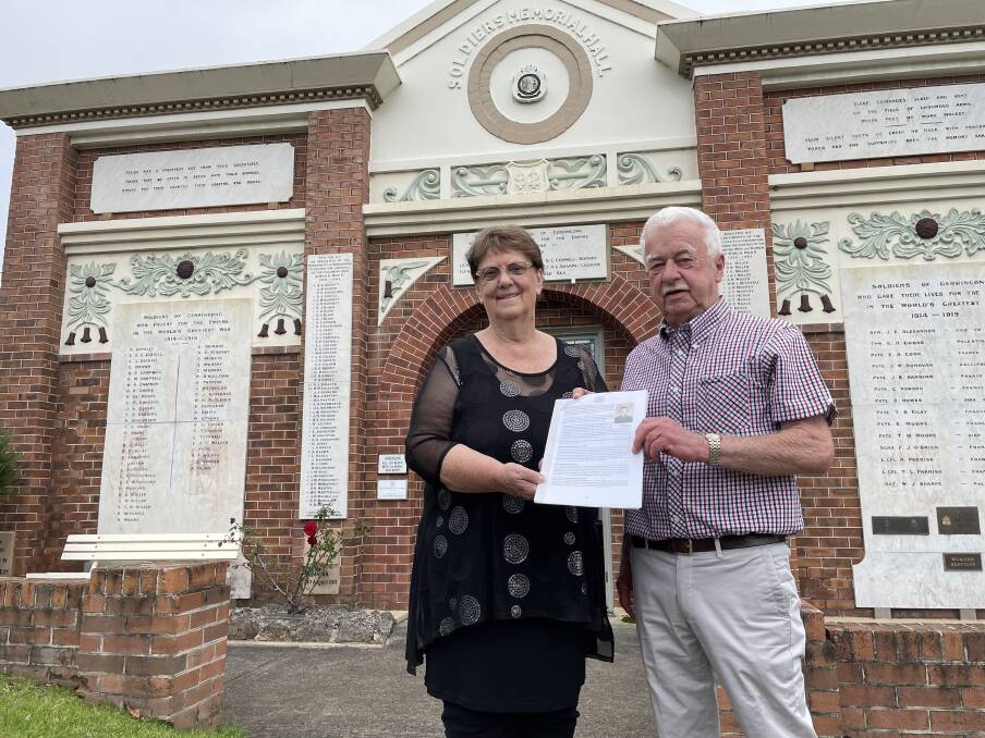 NEW BOOK: Author Robyn Florance and Gerringong RSL Sub-Branch president Michael O'Leary with the manuscript of Soldiers Memorial Hall Centenary book Mrs Florance has produced.