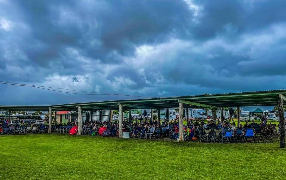 DIEHARDS: Even dark clouds overhead and consistent rain couldn't dampen spectators' enthusiasm at the Terara Country Music Campout.