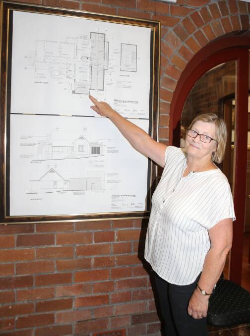 FUNDING NEEDED: Shoalhaven Historical Society president Lynne Allen with the recently completed expanded plans for the Nowra Museum.