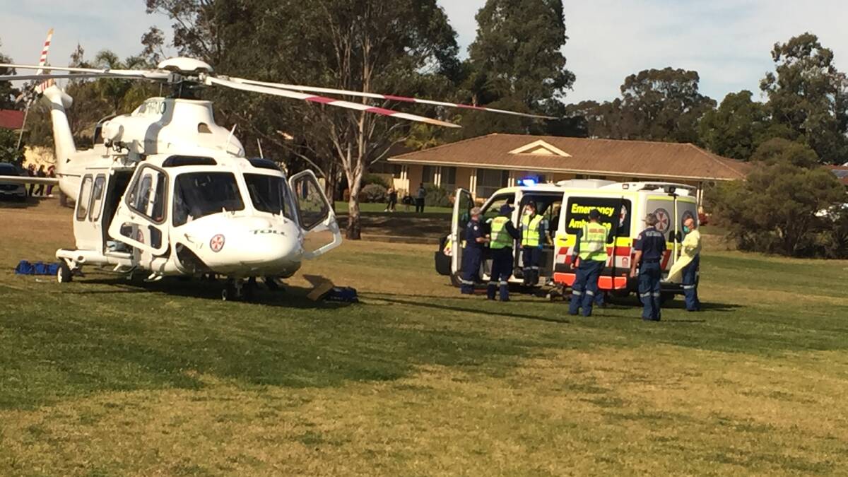 AIRLIFT: The Toll NSW Ambulance Rescue Helicopter landed at Worrigee before airlifting an injured motorcyclist to St George Hospital.