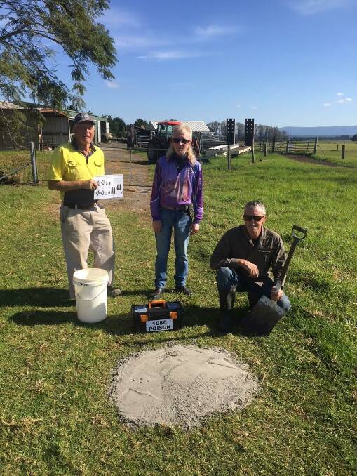 TARGET: Landholder Tim Samways with Shoalhaven Fox Control volunteers Dean Small and Mick Ware setting up a fox control station at Worrigee this week.