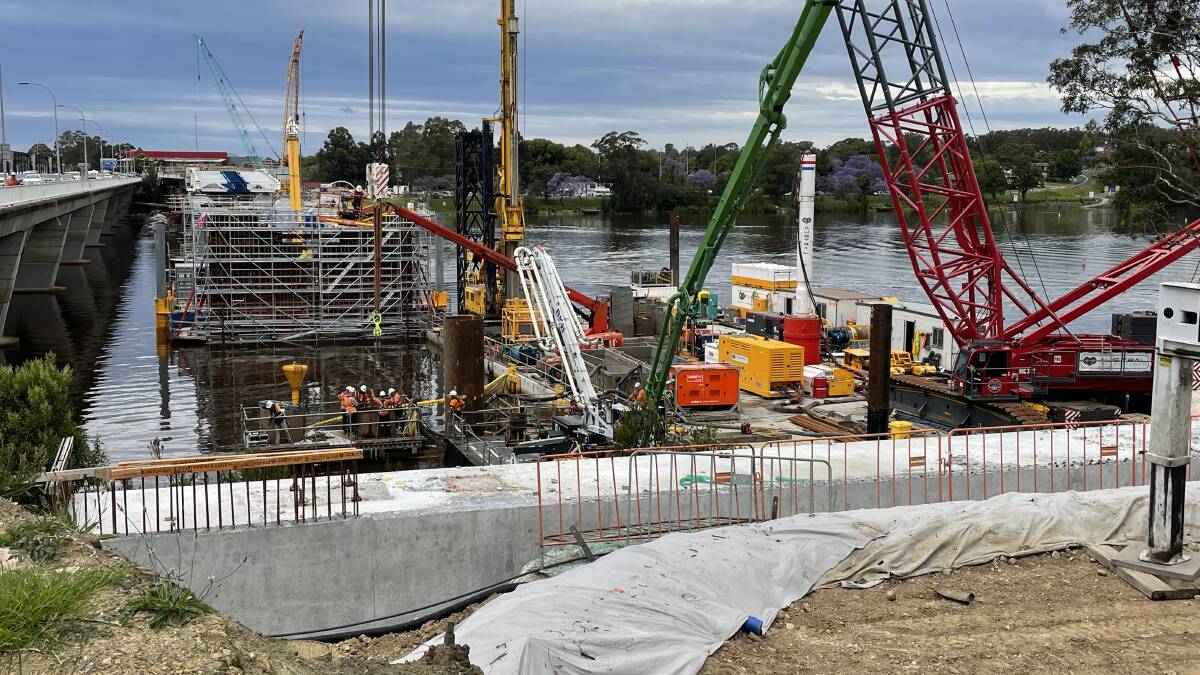 WORK: The new $342 million Nowra bridge continues to inch its way across the Shoalhaven River. There will be changed traffic and pedestrian conditions around the worksite from next Wednesday, December 1. 
