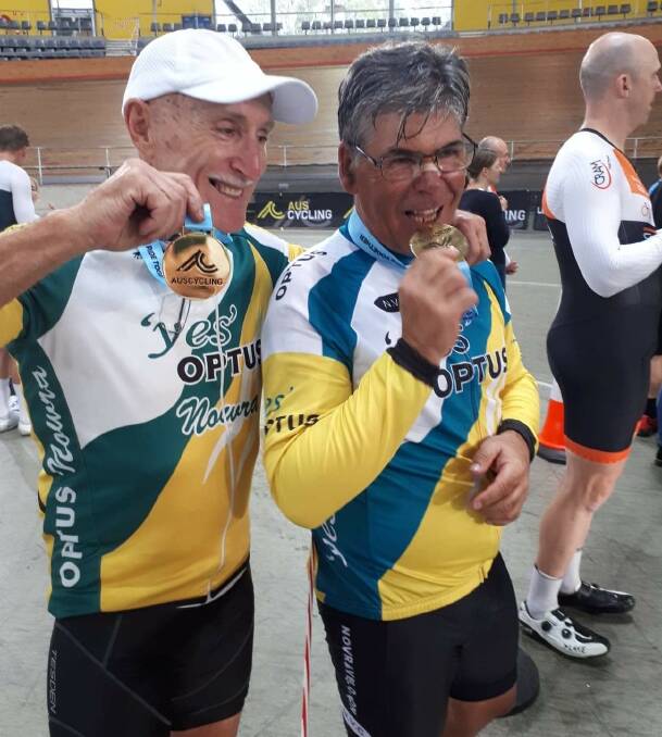 STATE GOLD: Alex Verdi (Masters 9) and Adrian McMillan (Masters 8) with their NSW Individual pursuit gold medals. Image: Supplied 