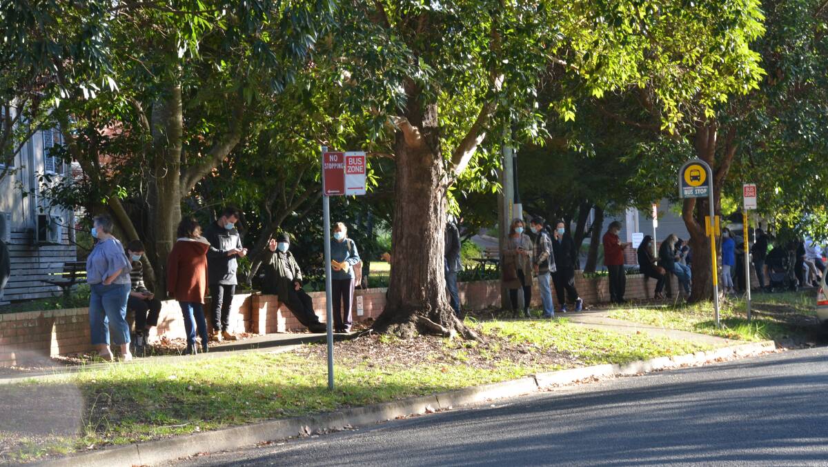 WAITING: The COVID testing lines at Shoalhaven District Hospital on Wednesday morning stretched out through the hospital grounds and out onto the nearby Shoalhaven Street.