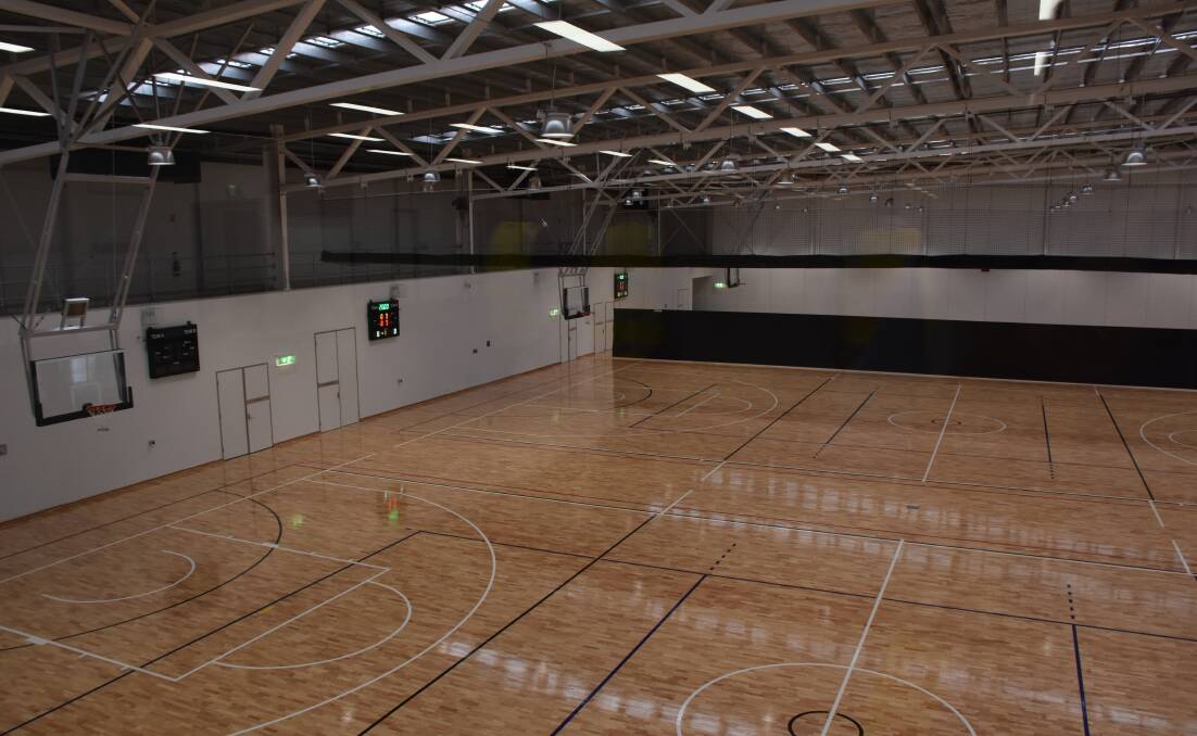 The view over the three adjoining courts of the Shoalhaven Indoor Sports Centre from the mezzanine area.