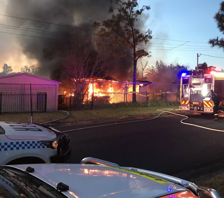Fire and Rescue NSW Nowra and Shoalhaven crews battle Monday morning's house fire.

