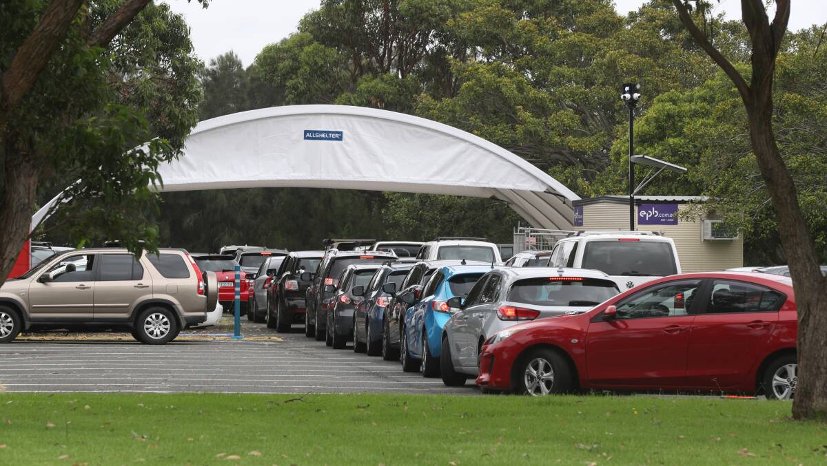 The lineup on Monday January 10 at the COVID PCR test site on Northcliffe Drive Warrawong. Picture: Robert Peet