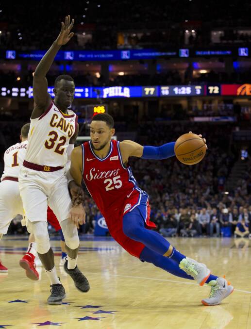 Deng Adel guards fellow Aussie Ben Simmons in one of his 19 appearances for the Cavs in 2019. Photo: NBA