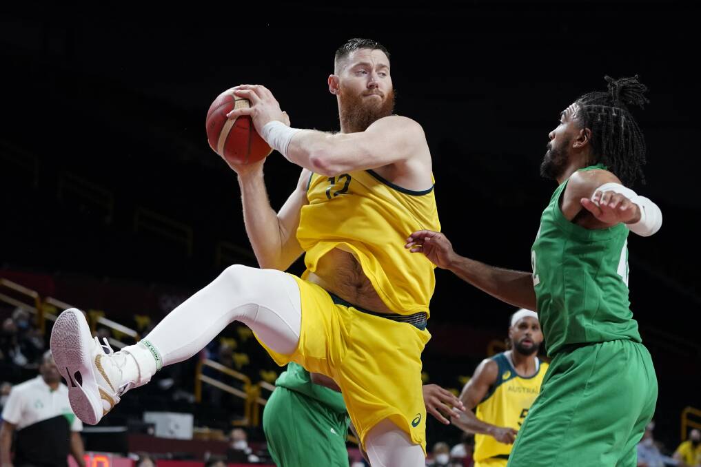The Boomers will be without key big Aron Baynes for the remainder of the Tokyo campaign. Photo: AP