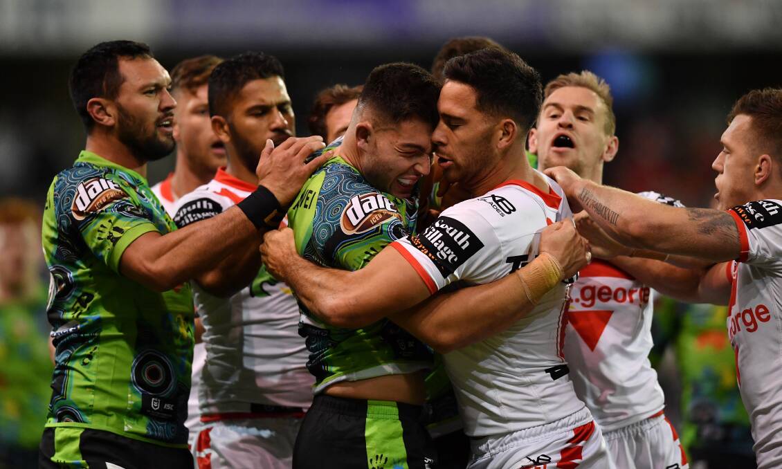 OUCH: A scuffle ensues following Nick Cotric's tackle on Tim Lafai that saw him sent from he field on Sunday night. Photo: NRL Photos