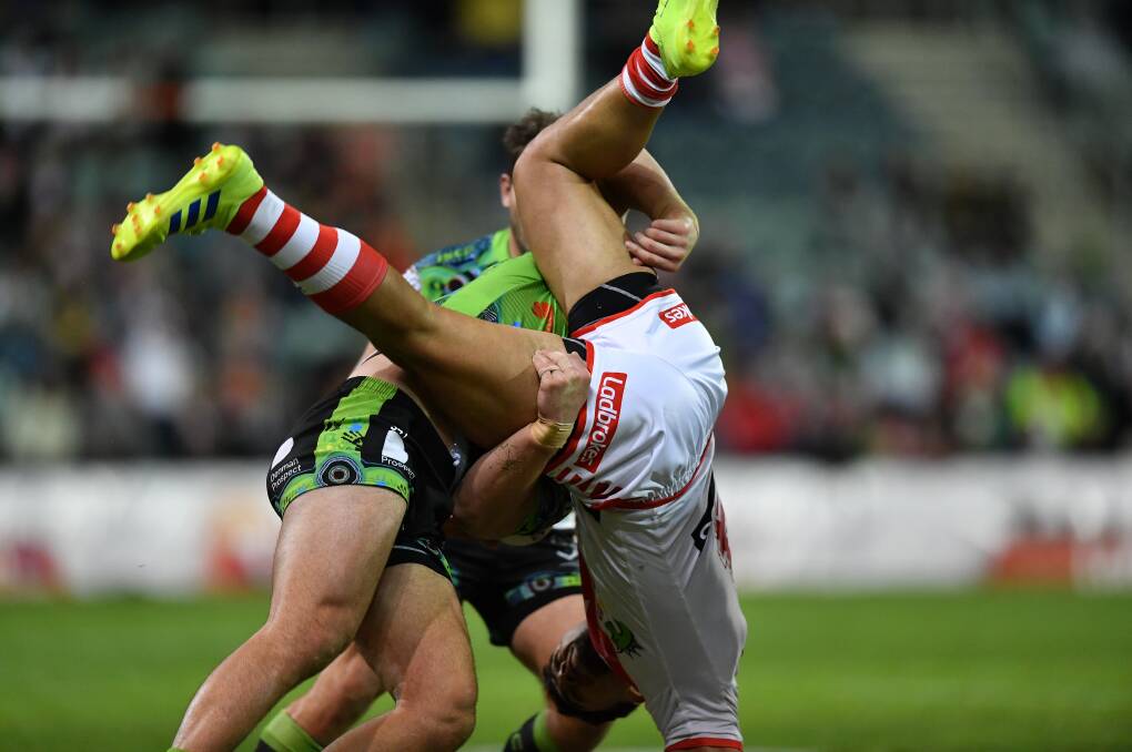 NASTY: Nick Cotric became the first player sent off for a dangerous throw since 1995 for this tackle on Tim Lafai on Sunday night. Photo: NRL Photos