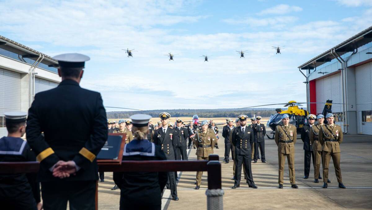Royal Australian Navy EC-135 Aircraft from 723 Squadron conduct a fly past during the 723 Squadron Graduation Ceremony held at HMAS Albatross in Nowra. Photo: Leading Seaman Ryan Tascas
