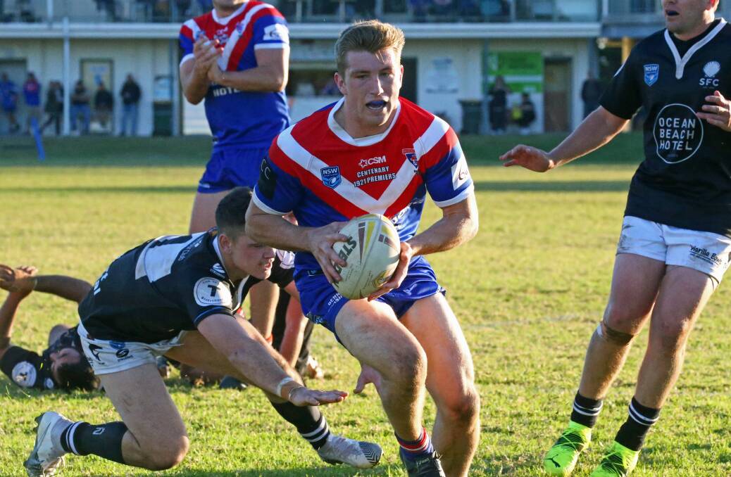 Play maker: Lion Toby Gumley-Quine, pictured breaching the Sharks' defence last season, was pivotal in Gerringong's round one win over Jamberoo. Picture: Game Face Photography