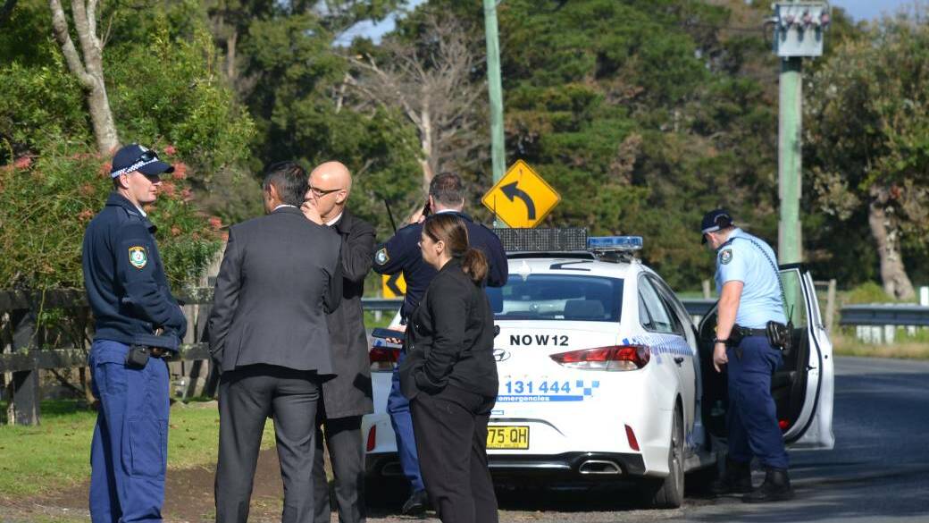 Police and detectives at the scene of an alleged murder in Numbaa, a quiet rural area east of Nowra on Friday.