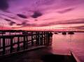 Sailors' warning? This stunning image of Callala Bay at sunrise was captured by Lisa Quinn. 