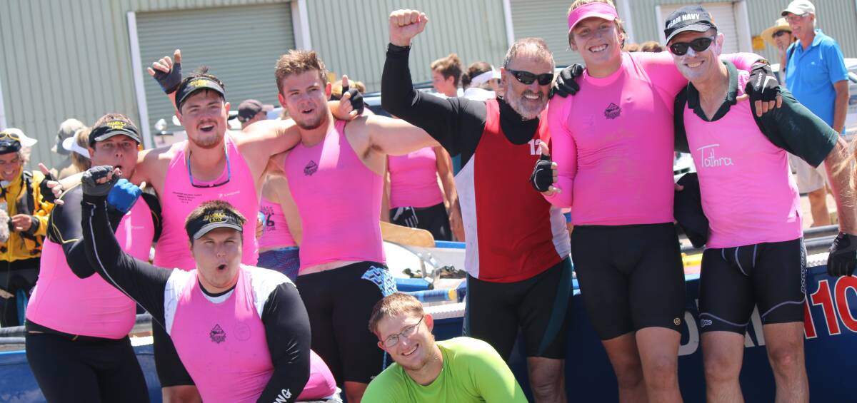 Strong finish: The combined Pambula-Tathra junior George Bass crew celebrates with sweep Stuart Manson (back, centre) after landing at the Eden Wharf on Saturday. 