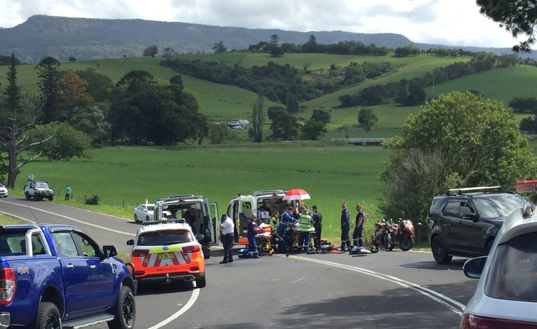 Emergency services tend to the injured rider. Picture: Sylvia Liber 
