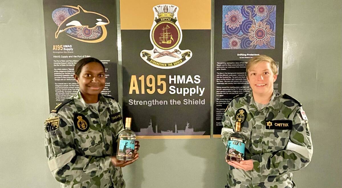 HMAS Supply crew members with The Commissioning Gin. Photo supplied