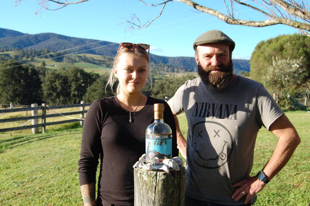 WINNING RECIPE: North of Eden's apprentice distiller Ruby Davis with Gavin Hughes, chuffed with the result of the handcrafted Commissioning Gin for crew of HMAS Supply. Photo: Leah Szanto