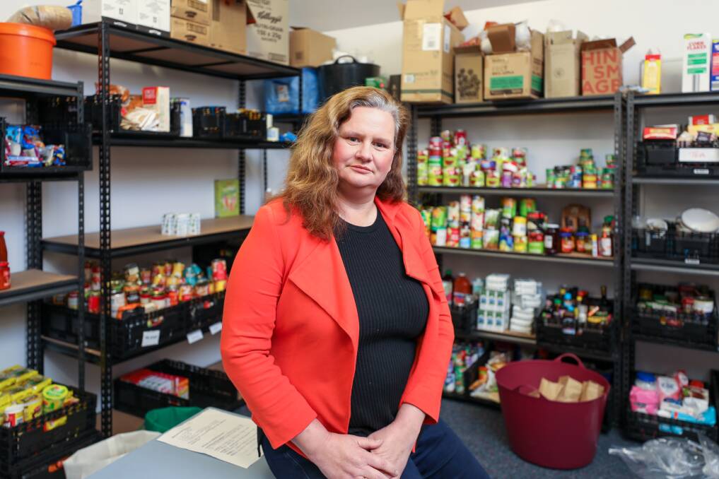 Mandy Booker CEO of Wollongong Homeless Hub inside the charity's food pantry in Unanderra. Picture by Adam McLean