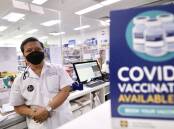 Pharmacist Thomas Ho from Downtown Pharmacy for story on COVID vaccine supply. Picture: Adam McLean 