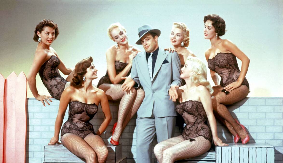 Marlon Brando, centre, in Guys and Dolls (1955). Picture: Supplied

