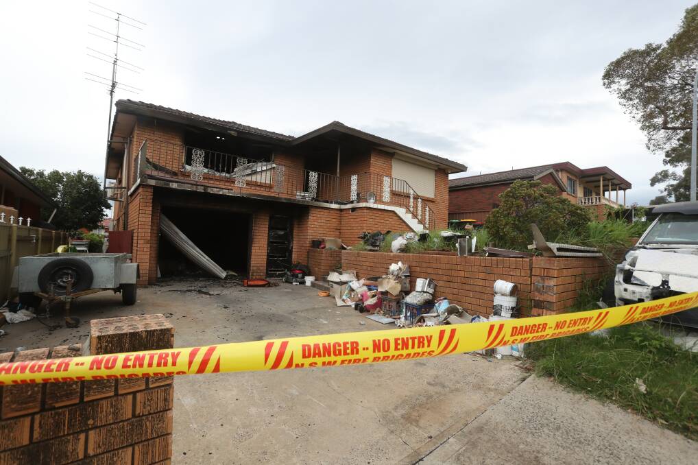Fire: A home in Darren Avenue Kanahooka was destroyed by fire on Sunday night. Pictures: Robert Peet