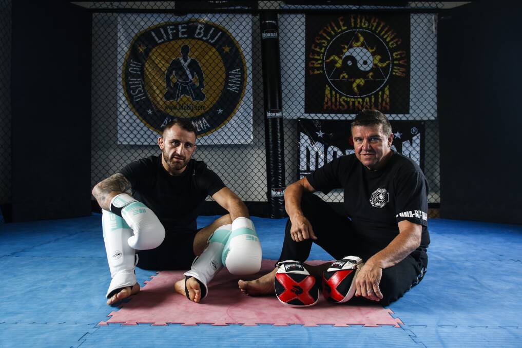 TIME HAS COME: Alex Volkanovski and coach Joe Lopez at Windang's Freestyle Fighting Gym. Photo: Anna Warr