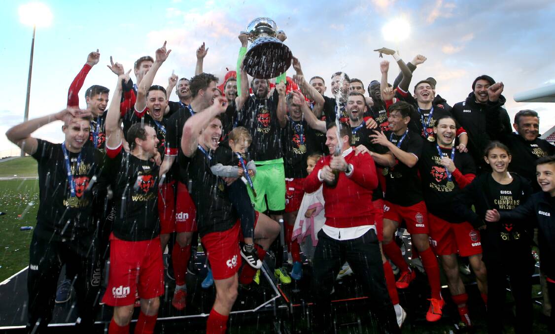 The Wollongong Wolves celebrate their 2019 premiership. Photo: Sylvia Liber.