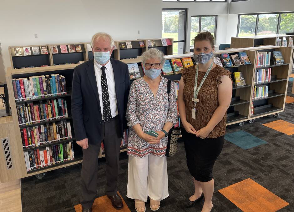 NEW: Kiama Mayor Mark Honey, Gerringong and District Historical Society member and former library manager Bobbie Miller, and library officer Lauren Watkins.
