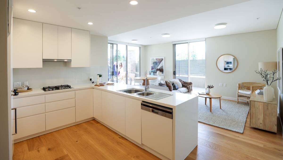 The kitchen and living area of one of the new Warrigal Shell Cove apartments. Picture by Adam McLean