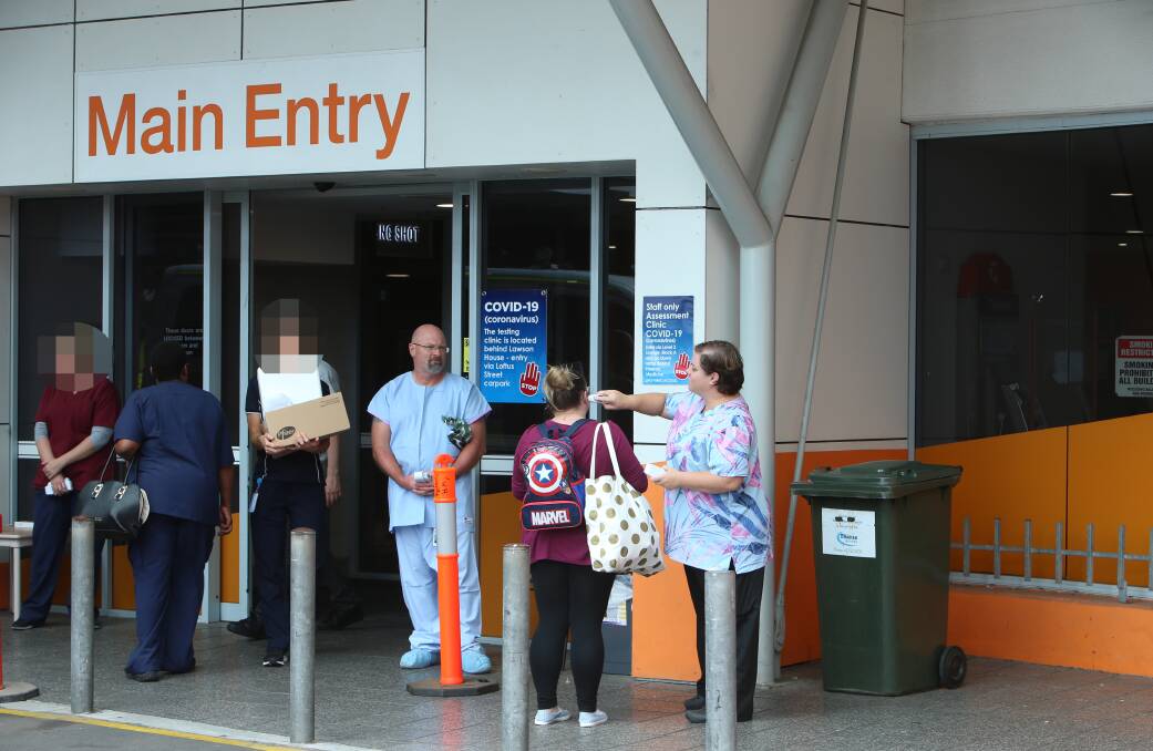 Testing times: Extra measures have been taken at Wollongong Hospital to reduce the spread of infection - including testing temperatures of patients, visitors and staff at the main entry. Picture: Sylvia Liber