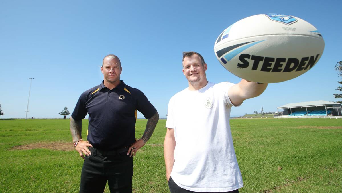 DEVASTATED: Group Seven rugby league operations manager Ashton Sims (black top) pictured here with Josh Morris, was devastated at the sudden passing of his former Brisbane and Cowboys coach Paul Green. Picture; Sylvia Liber.