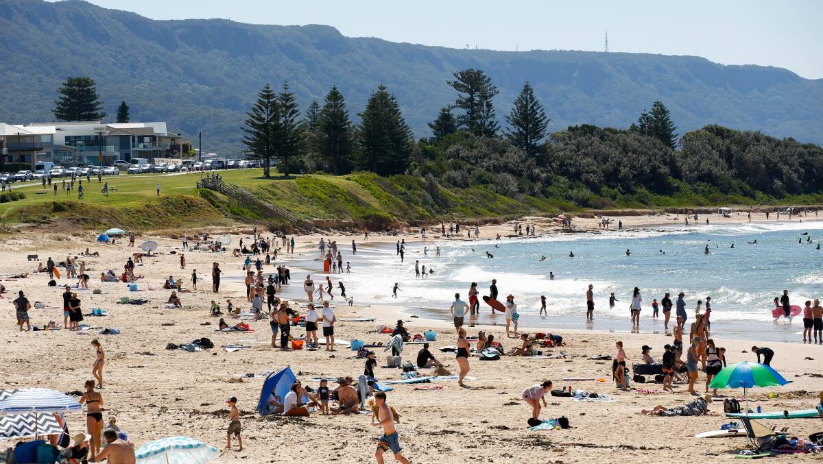 BULLI BEACH: Sunday's hot weather saw many head to the beach, with some lingering to sunbake in spite of current lockdown rules. Picture: Anna Warr