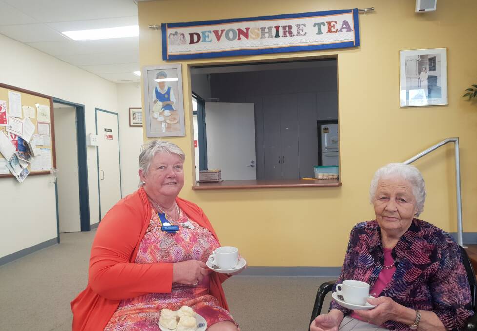 CWA Nowra president and patron Daisy King enjoy a catch up on Tuesday morning. 
