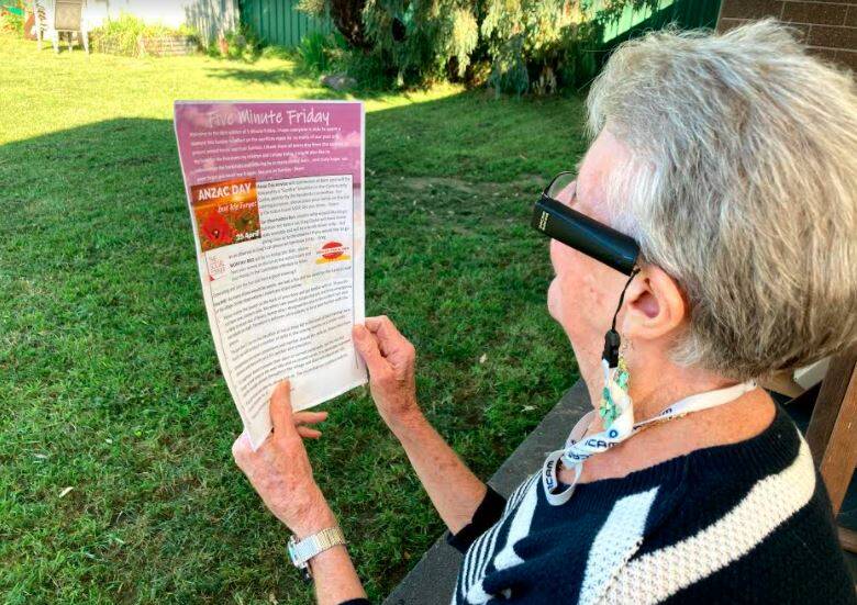 The OrCam MyEye allows Marion to enjoy the weekly newsletter at her St Geoge's Basin retirement village home. Image supplied.