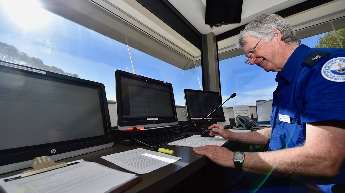 Neil Duffy operating the radio. Photo supplied.