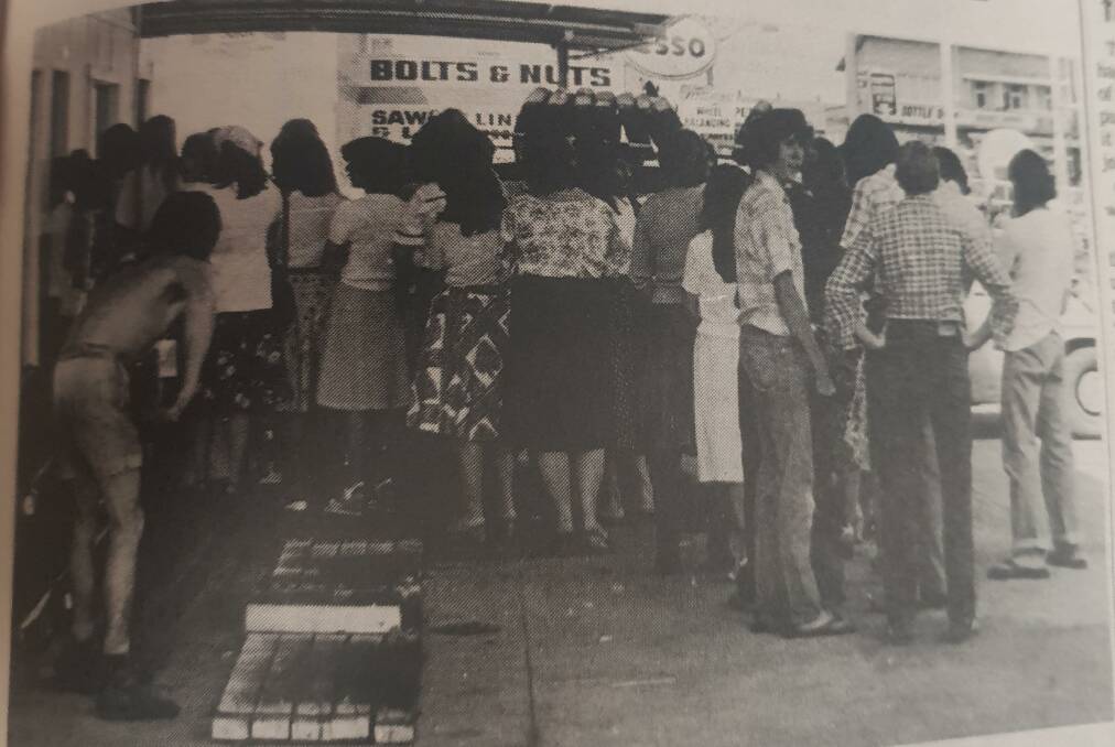 TOUGH TIMES: 267 young people lined up for six jobs on offer at a new fruit market. Some waited five hours to be interviewed. Photo: Shoalhaven Historical Society. 