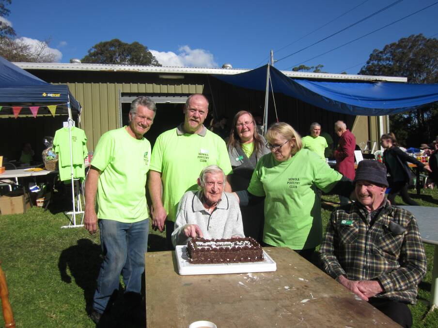 SIXTY CHEERS: Nowra Poultry Club’s Life Member, and former poultry judge, Jack Bethe celebrates the club's 60th show, surrounded by club president Laurie Talbot, past president Andrew Giles, secretary Carole Lacey, life member Judy Turner and past president Roger Arnold. Photo: contributed. 

​