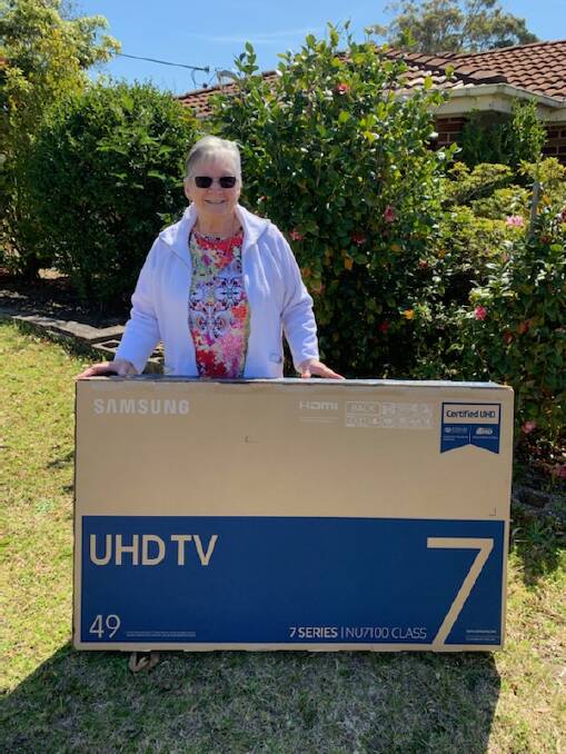Margaret Hoschke scored herself a new television in the raffle. Photo supplied. 