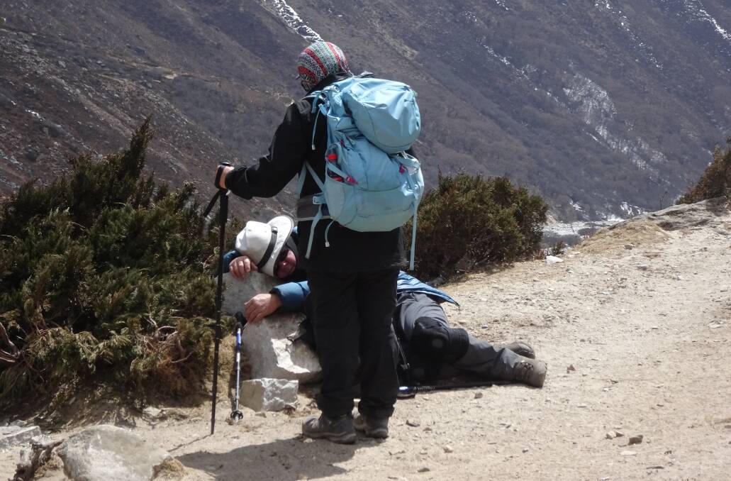 CHALLENGE: Hikers take a few moments to rest. Photo: supplied. 