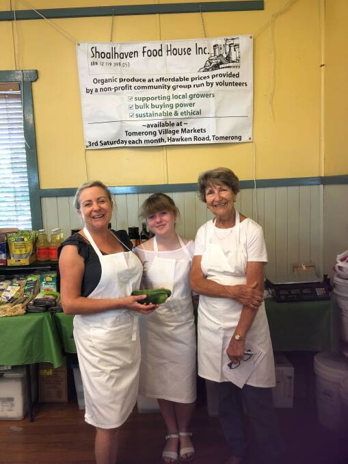 VOLUNTEERS NEEDED: Three generations of volunteers from the same family help out at the Shoalhaven Food House. Photo: contributed. 

